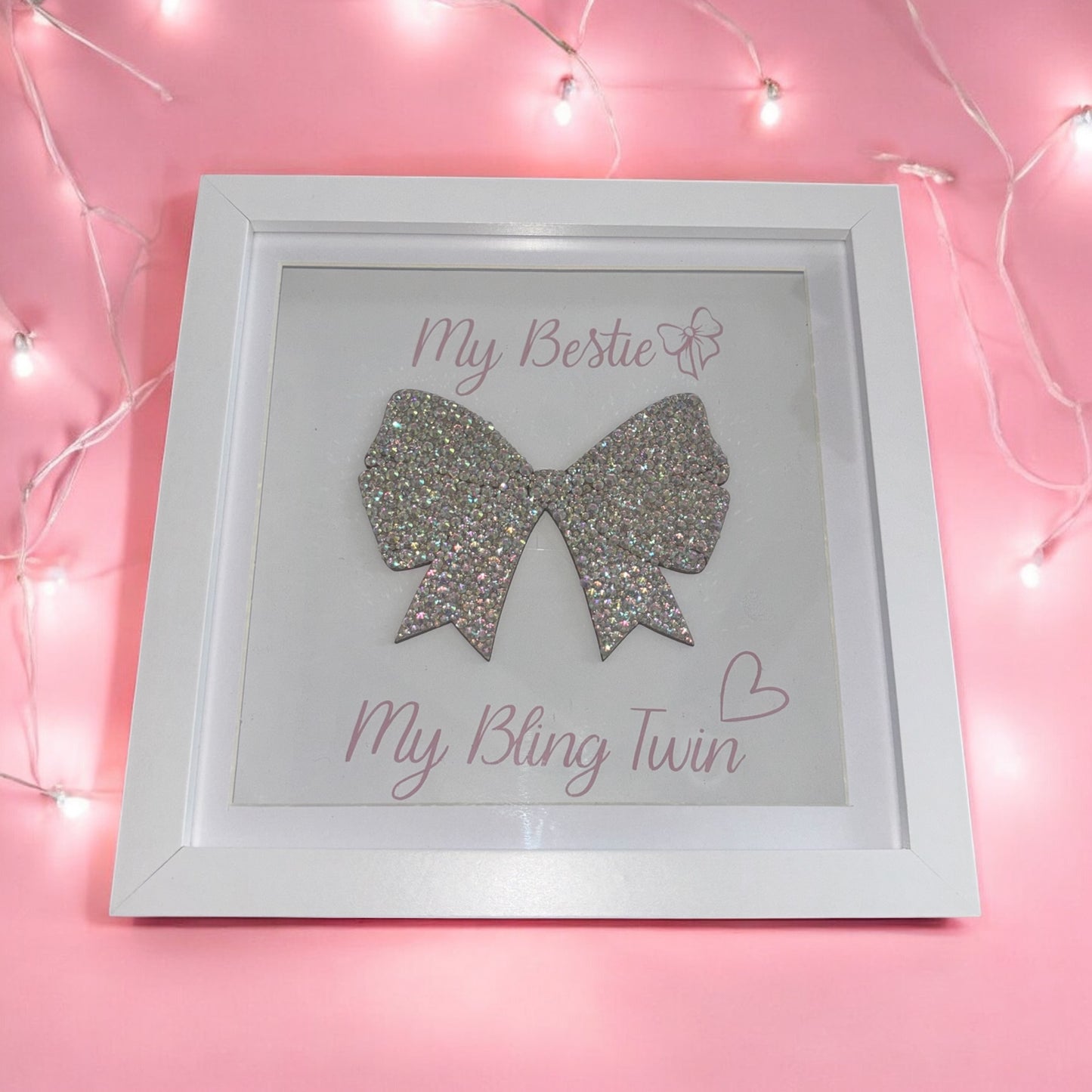 Wooden bow in box frame.