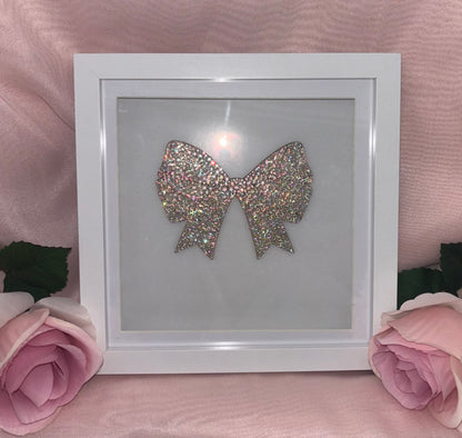 Wooden bow in box frame.