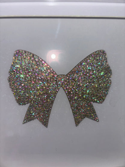 Wooden bow in box frame.